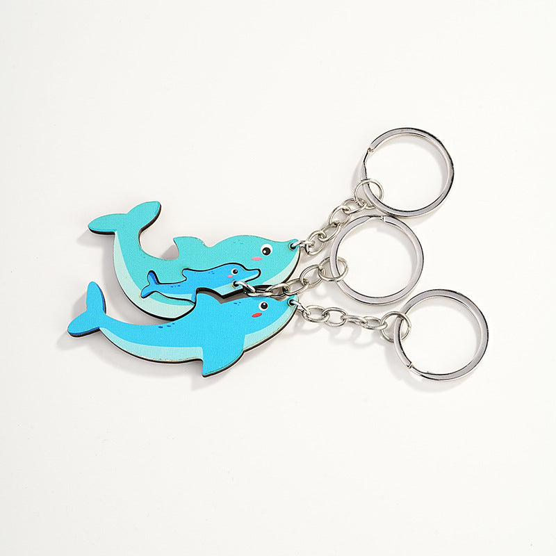 Wholesale of Cute Three Little Dolphins Wooden Parent-child Keychain